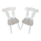 Pair of vintage white wooden bistro chairs