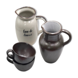 Two pitchers two cups sandstone