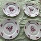 Set of 4 flat plates, in art deco porcelain