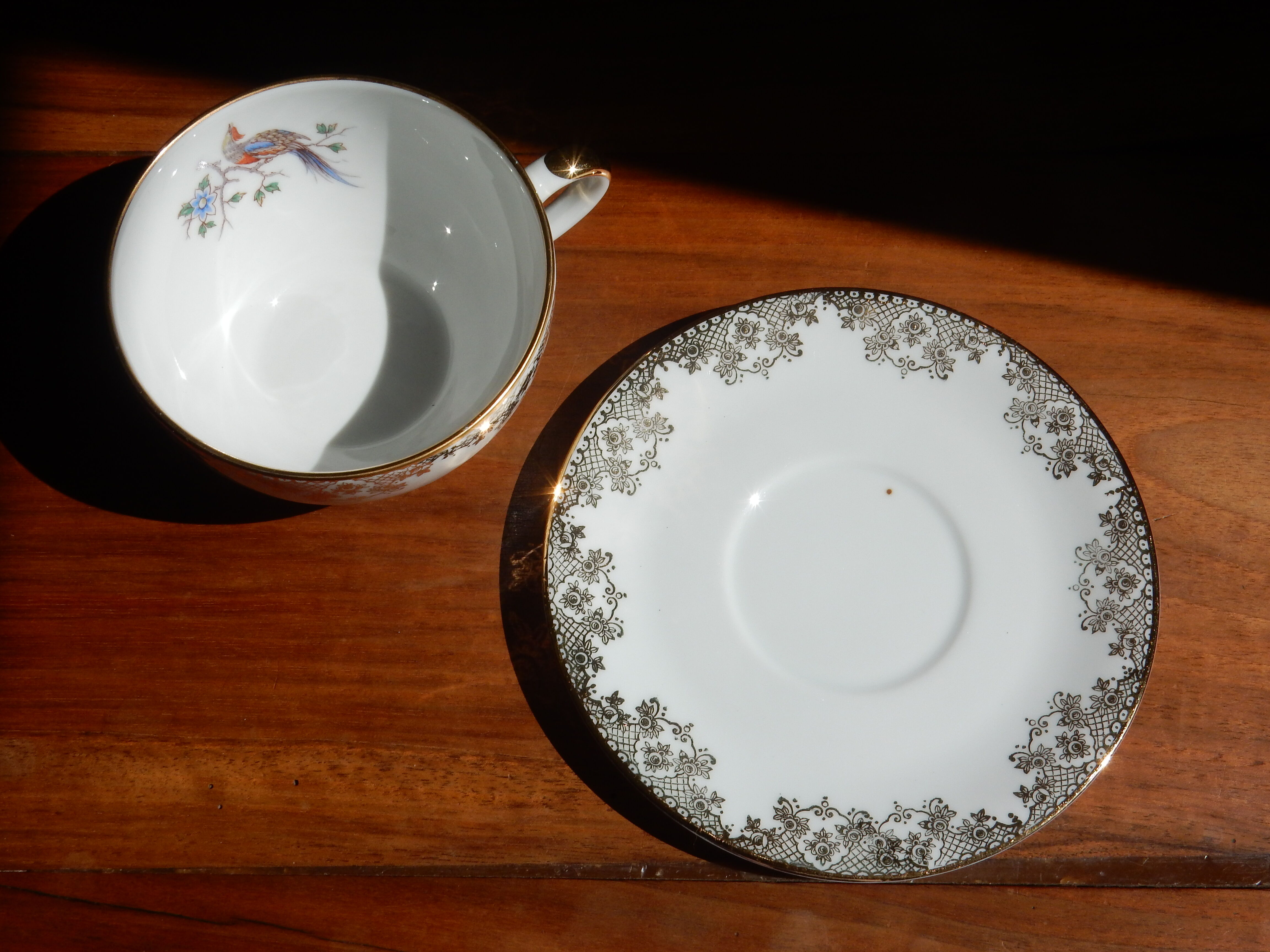 Charles Ahrenfeldt's teacup and subcup limoges