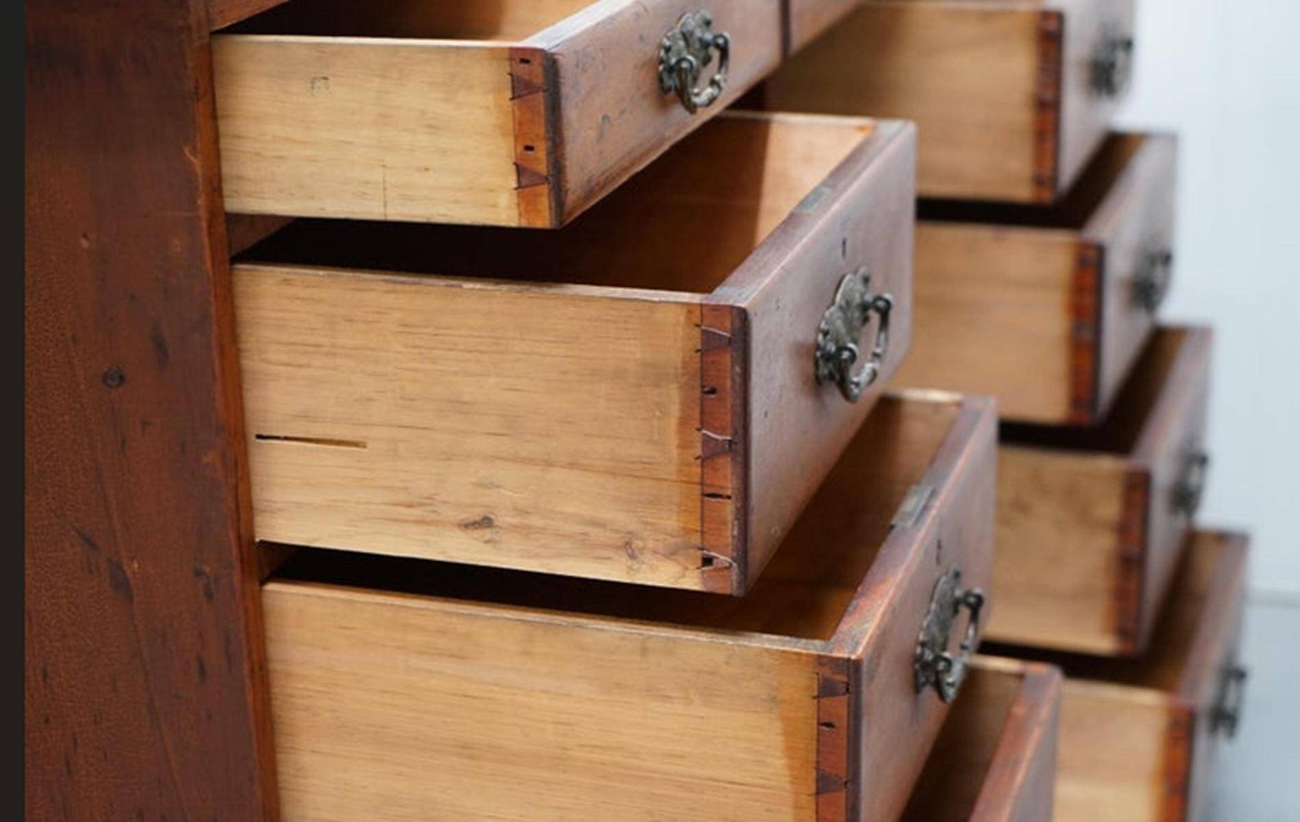 Small Victorian desk in solid walnut with drawers.
