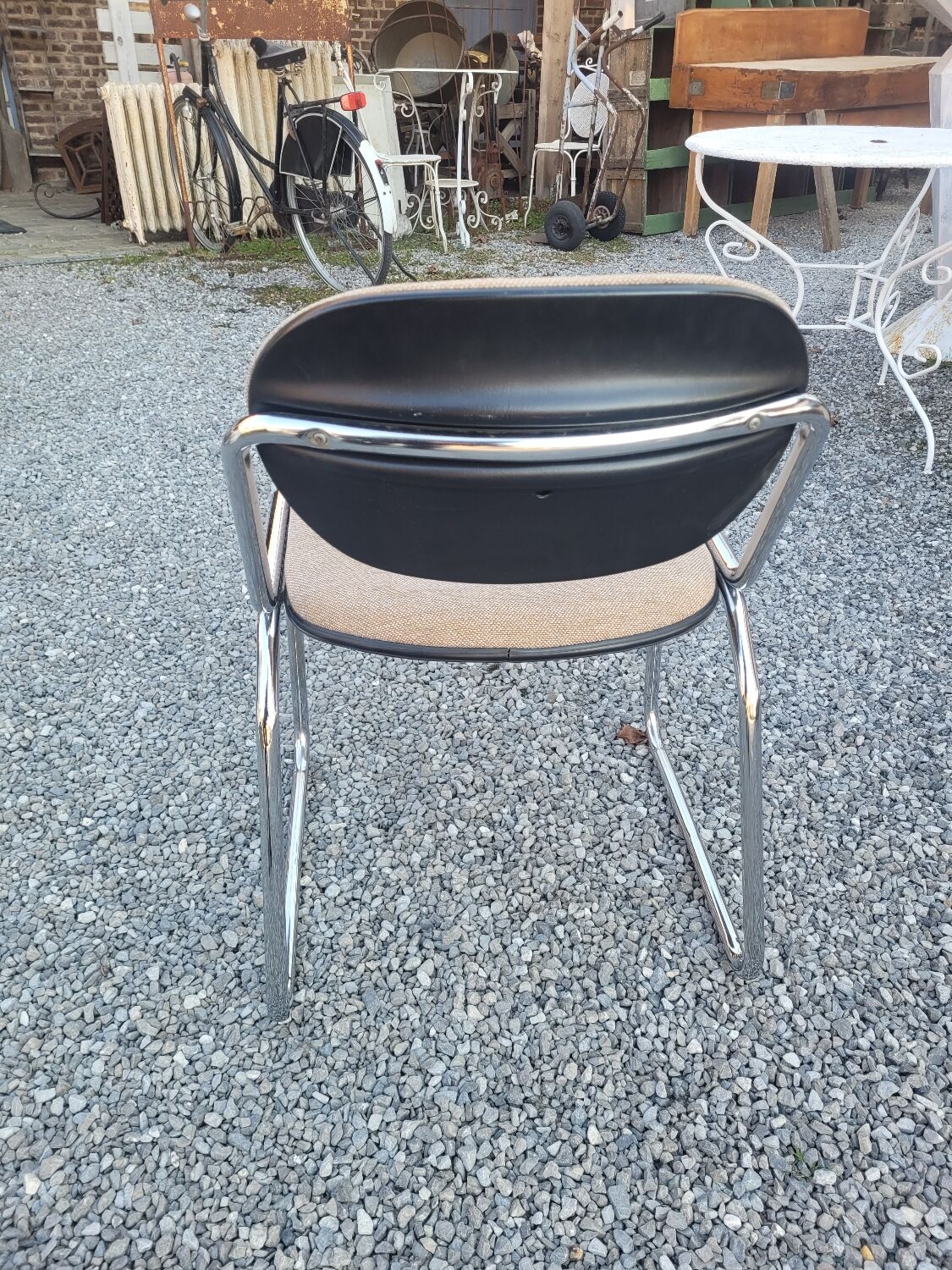 Vintage office chair with chrome base and fabric top