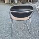 Vintage office chair with chrome base and fabric top