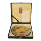 Japanese dish in gold brocade