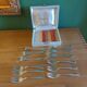 Box of 12 dessert forks in silver metal