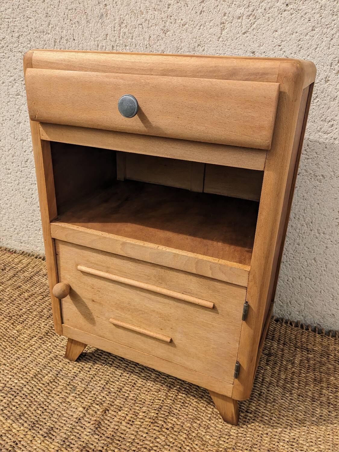 Vintage bedside table with compass legs