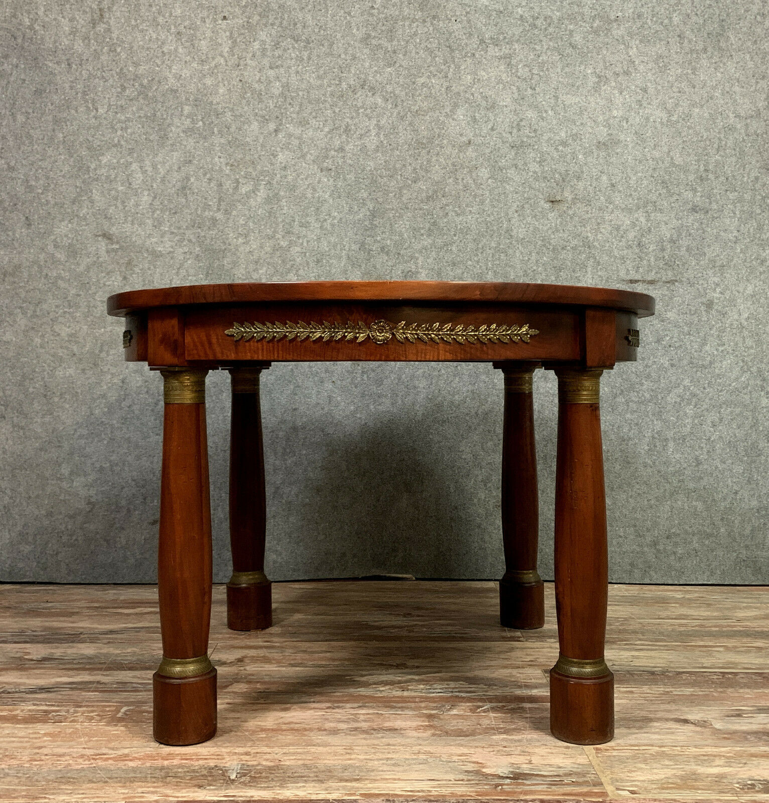 Empire table with blond walnut extensions around 1900