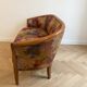 Two-seater banquette in Louis XV style made of wood and floral fabric.