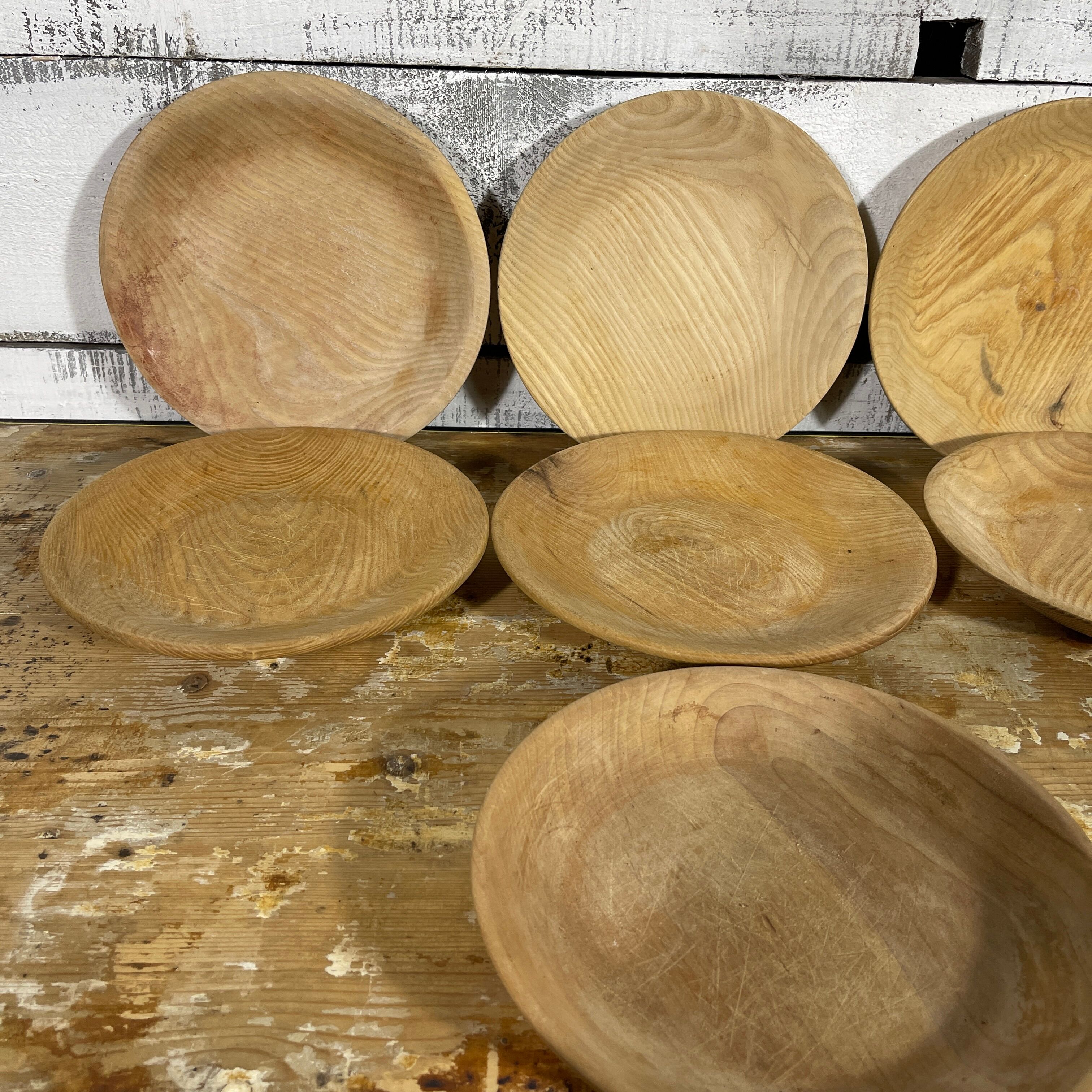 Series of 7 wooden plates