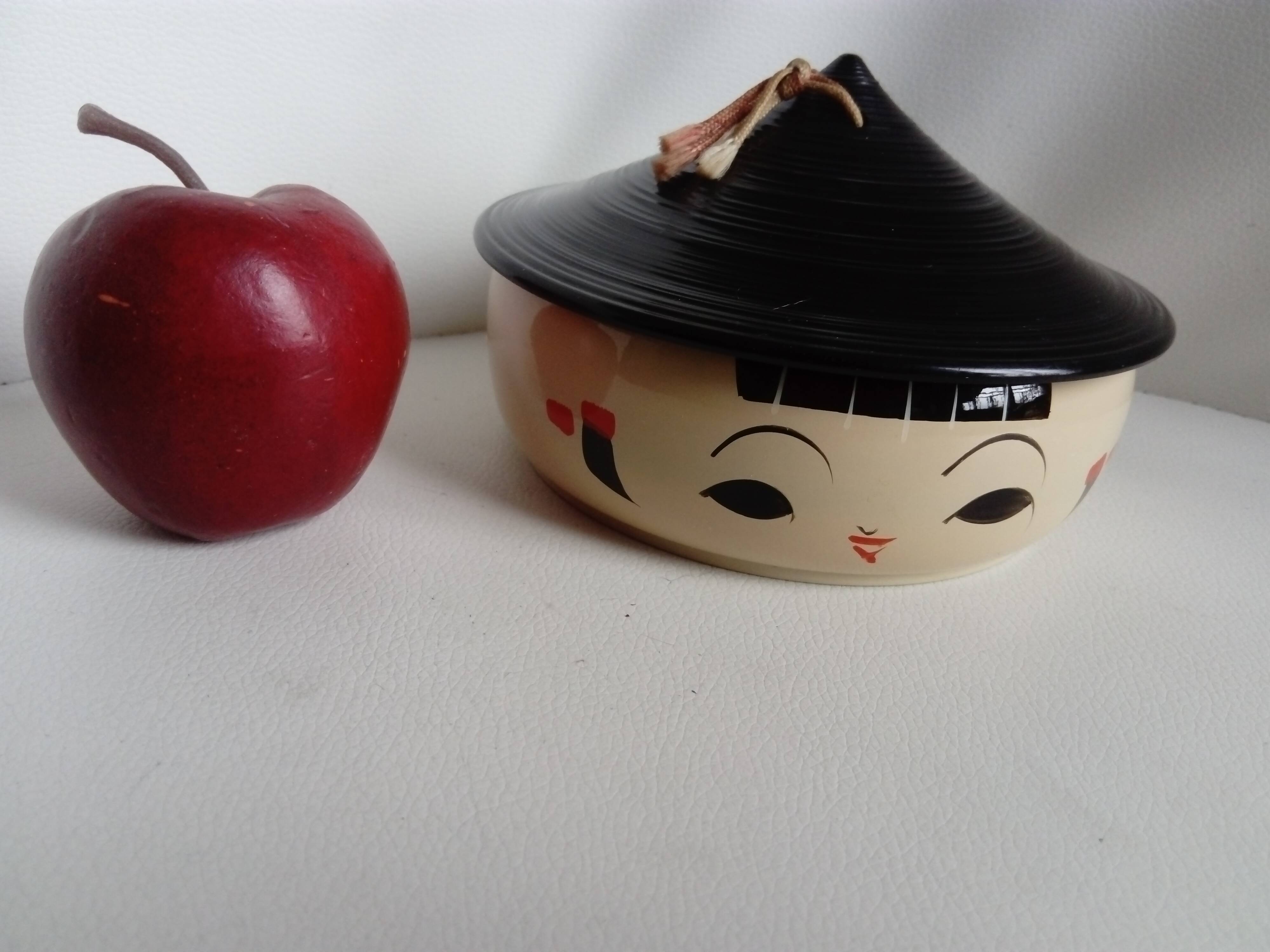 Vintage covered box in the shape of a kokeshi.Japan