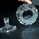 Thick moulded crystal sugar bowl with a beaded and medallion design.