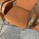 Set of 4 Art Deco armchairs in brown and coral with curved wood and upholstery fabric.