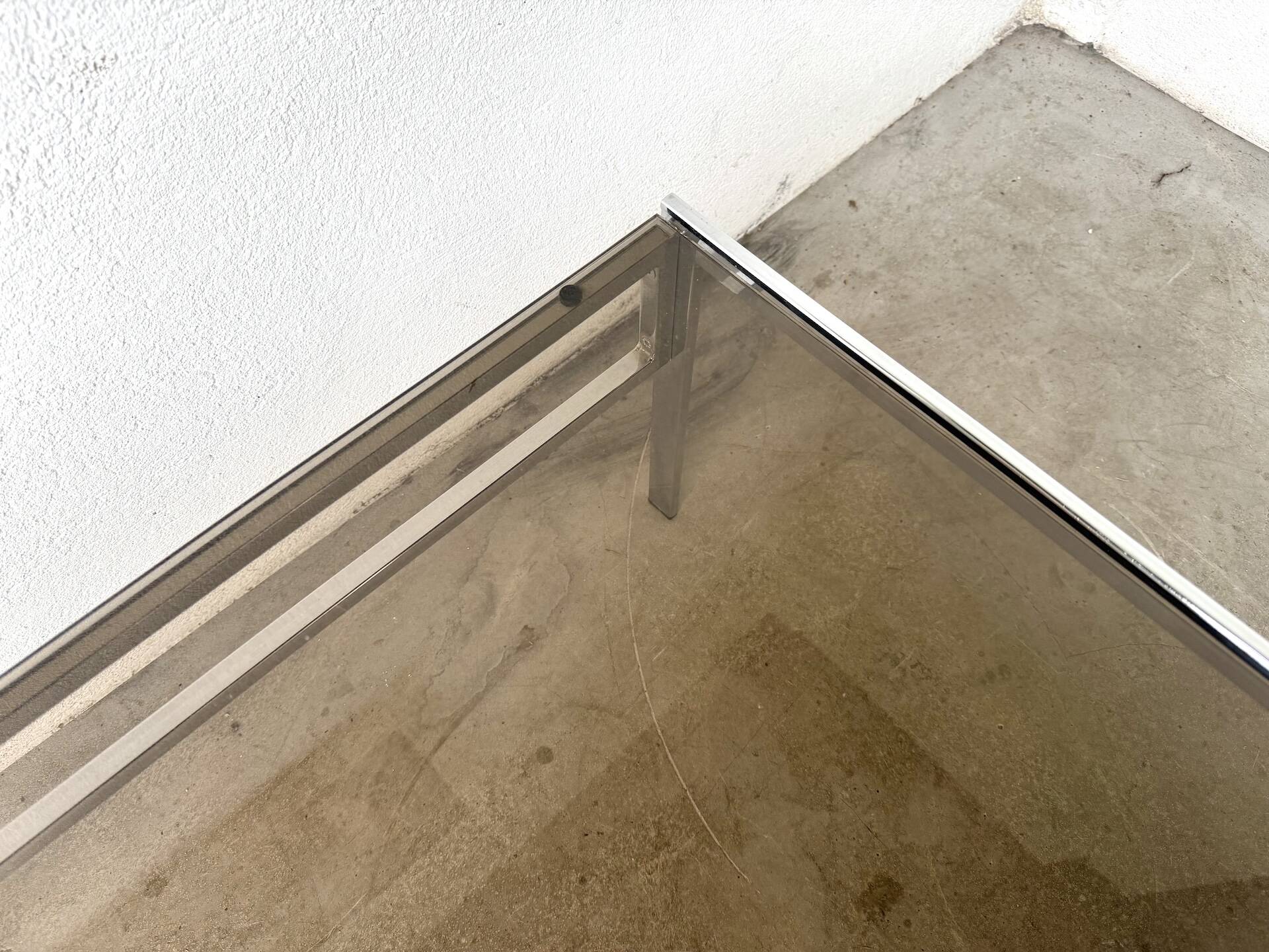 Modernist chrome and smoked glass coffee table, circa 1970