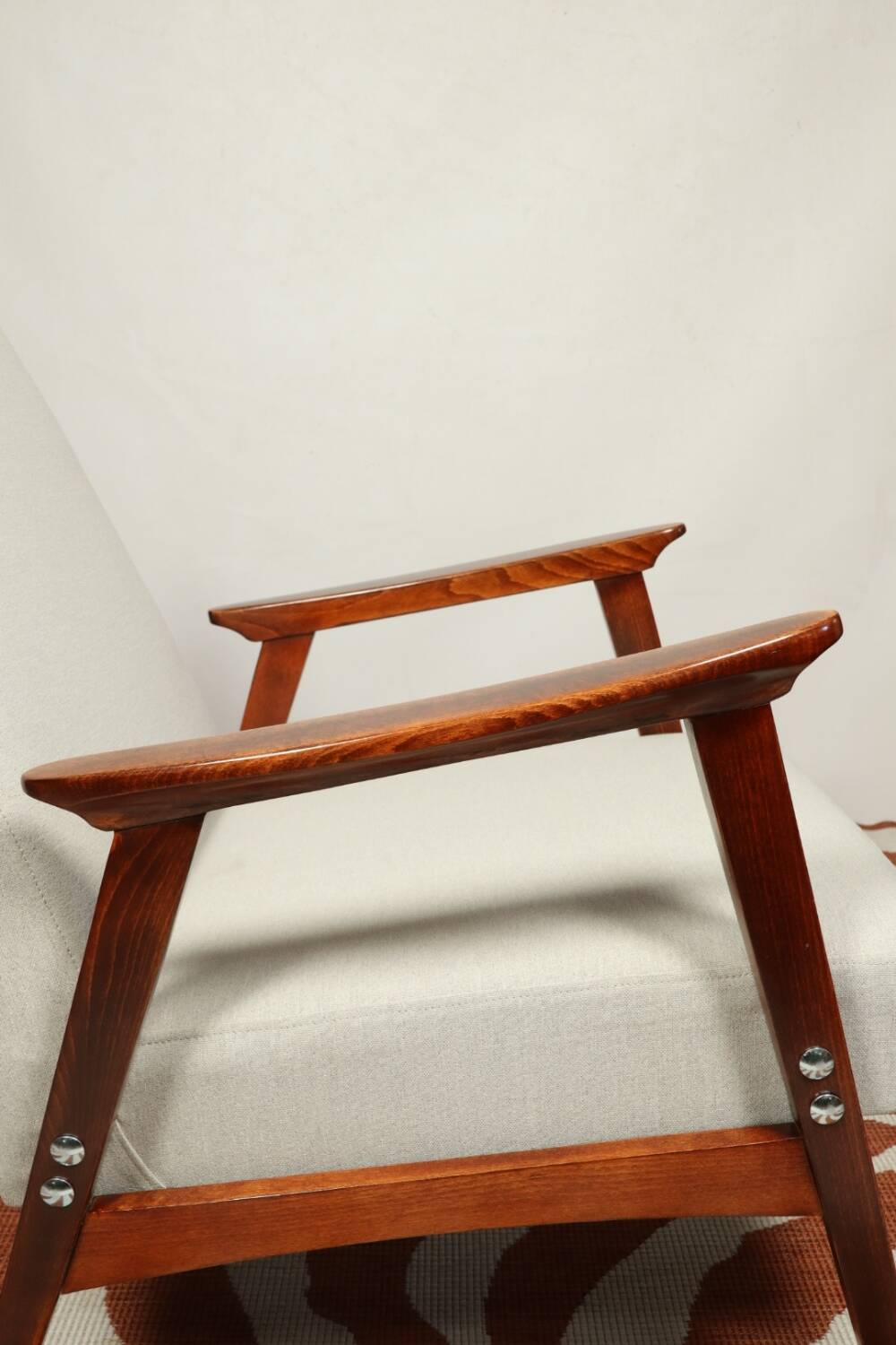 Vintage light gray armchair dark wood Scandinavian design 1970