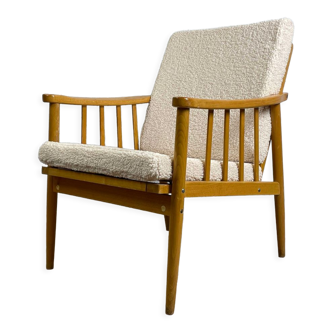 Reupholstered Scandinavian type oak armchair, origin Eastern Europe, 70s-80s