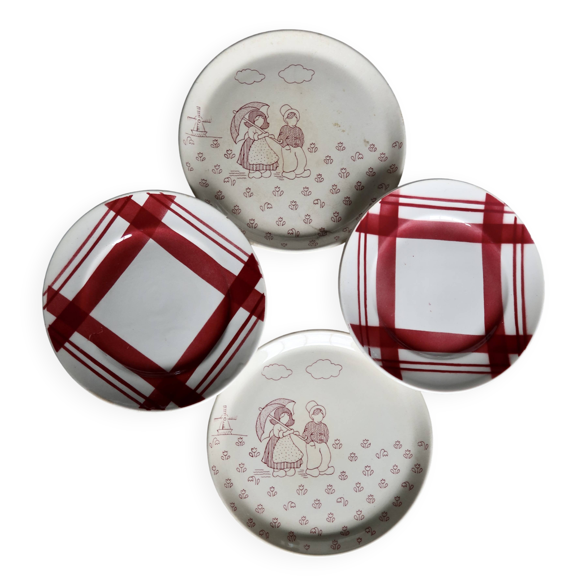 Vintage mismatched earthenware dessert plates with red patterns