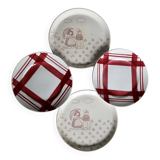 Vintage mismatched earthenware dessert plates with red patterns