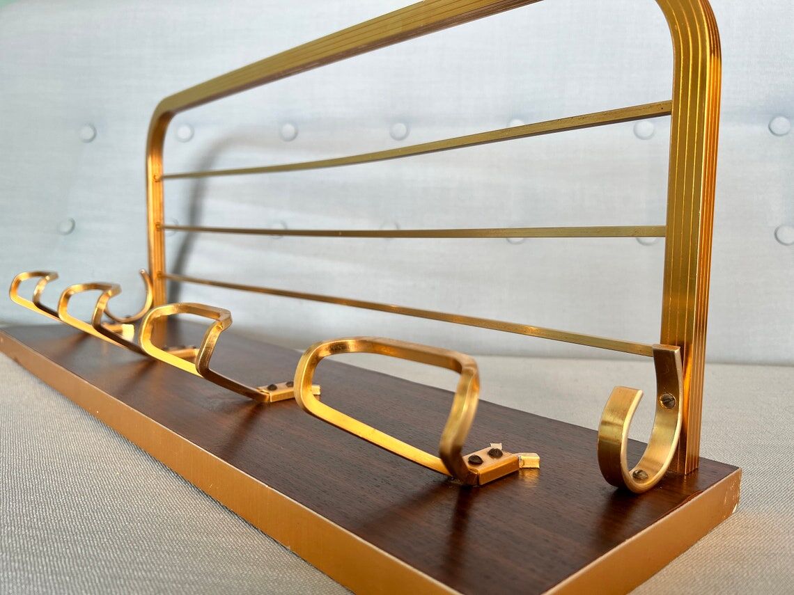 Vintage coat rack with 1970s repai décor