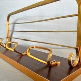 Vintage coat rack with 1970s repai décor