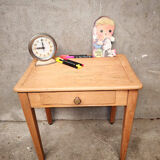 Small children's desk or side table.
