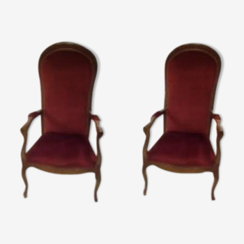 2 red voltaire armchairs