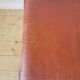 Pair of Dyrlund leather footrest 60s leather