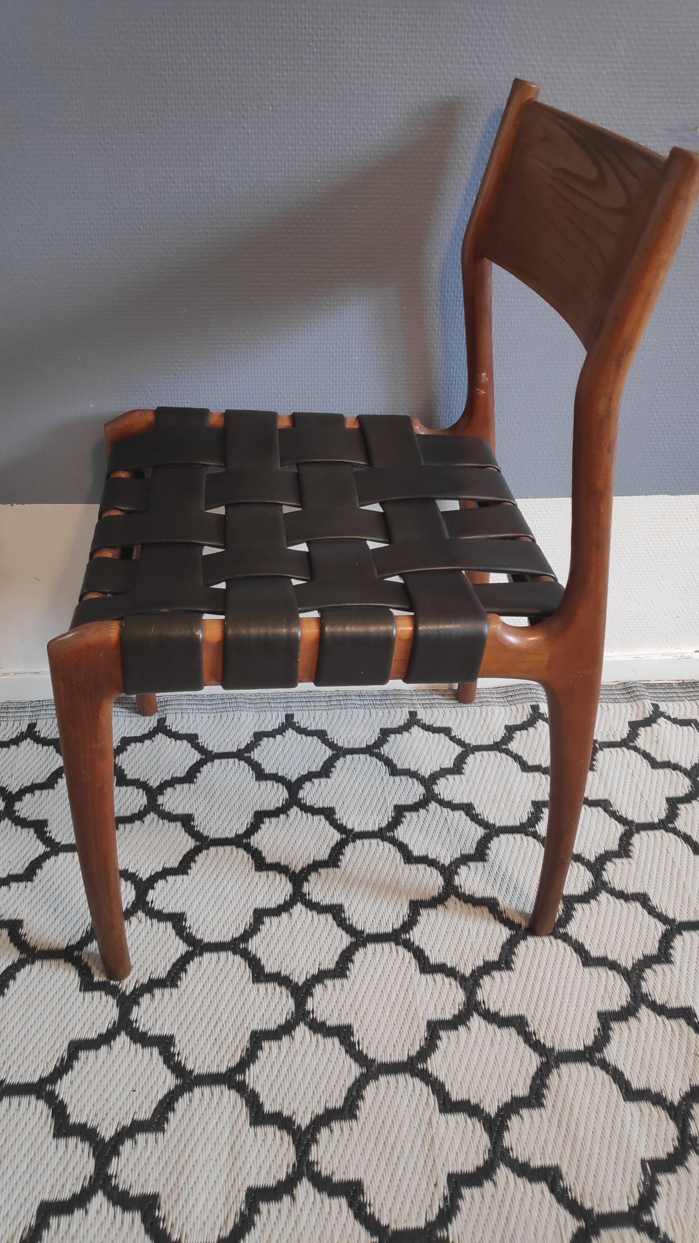 chair wooden structure and sitting with braiding of black skai strips