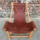 Vintage tripod armchair, designer seating furniture