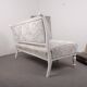Two-seater canapé painted white with reupholstered beige fabric, wooden frame painted in 1890 style.