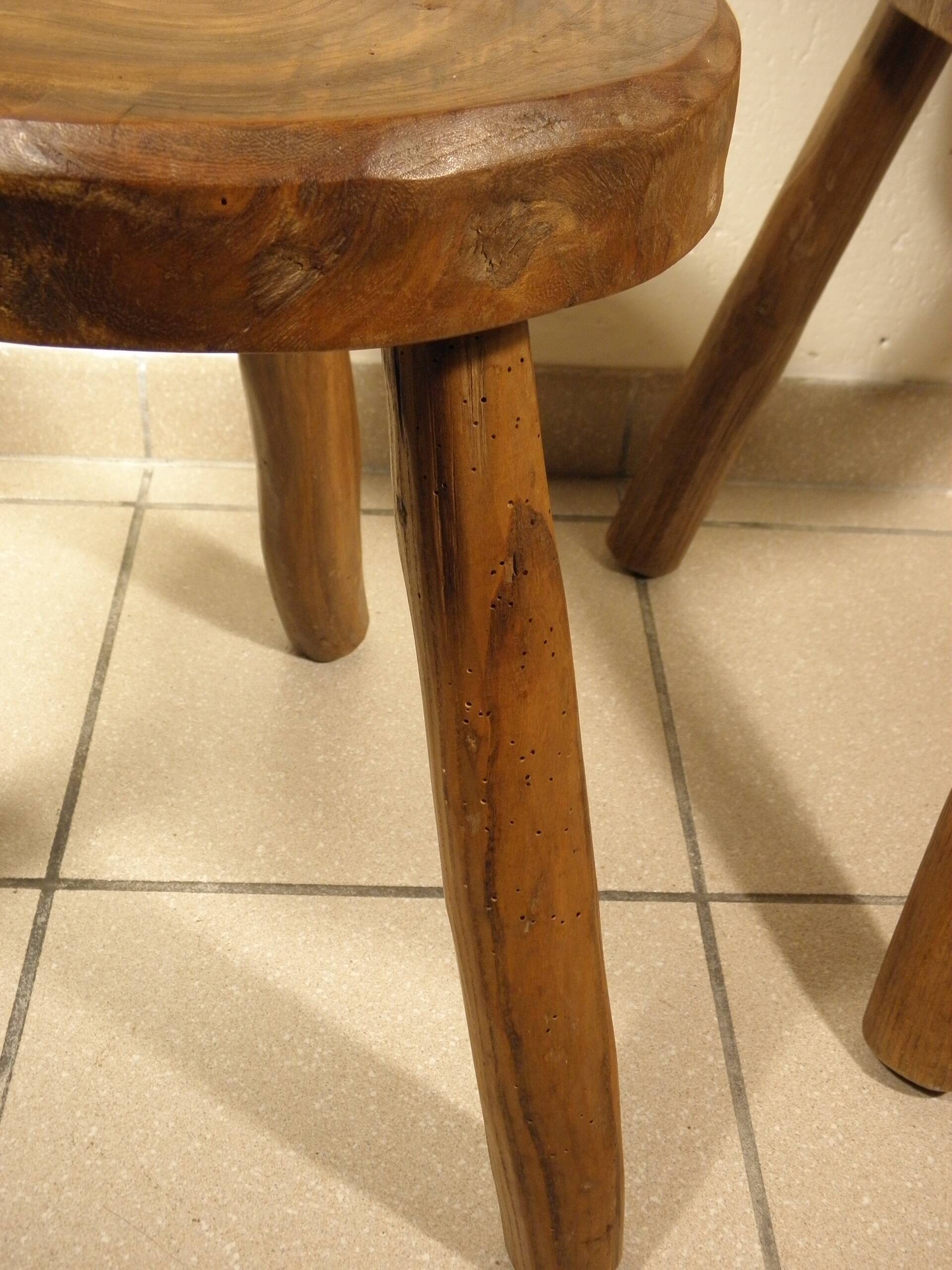 Pair of wooden tripod stools
