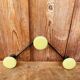 Vintage yellow wall coat rack