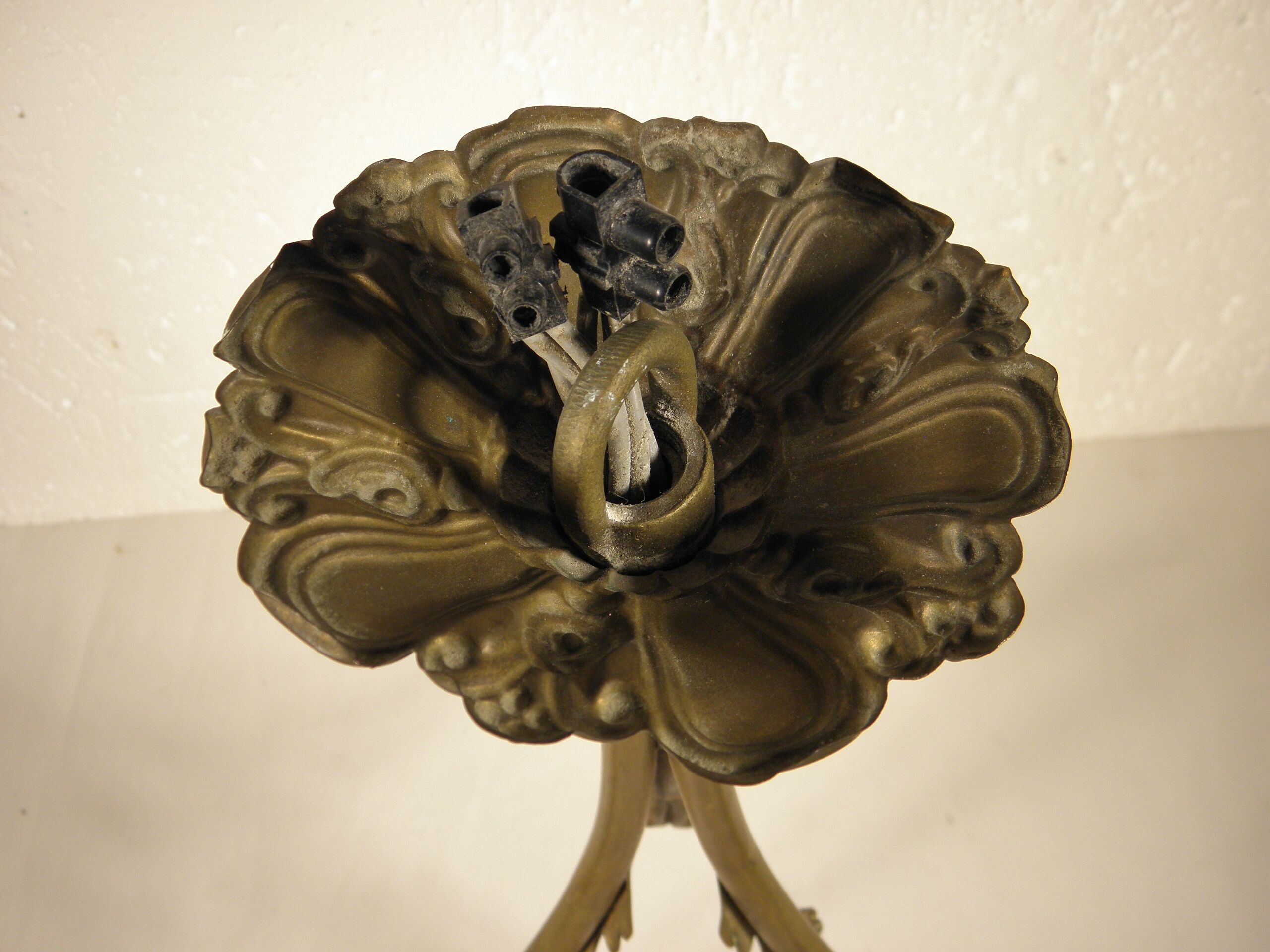 Three-spoke brass and glass chandelier