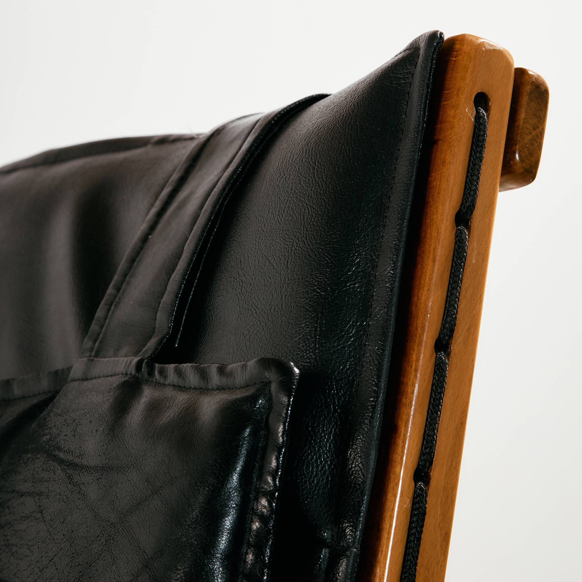 Beech armchair with leather upholstery