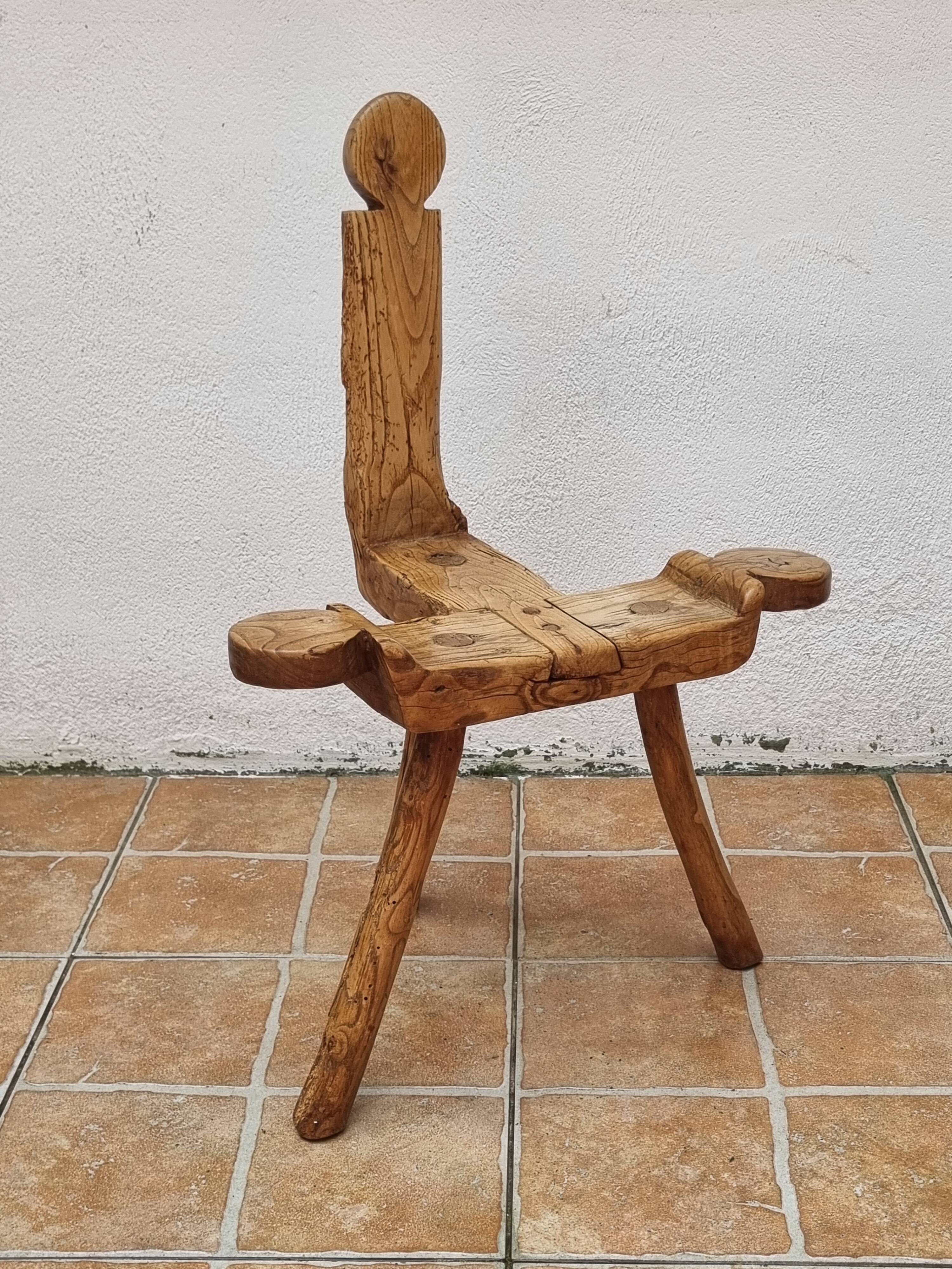 Brutalist chair in solid wood, European handcrafted work from the early 20th century.
