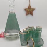 vintage digestive decanter and its matching glasses