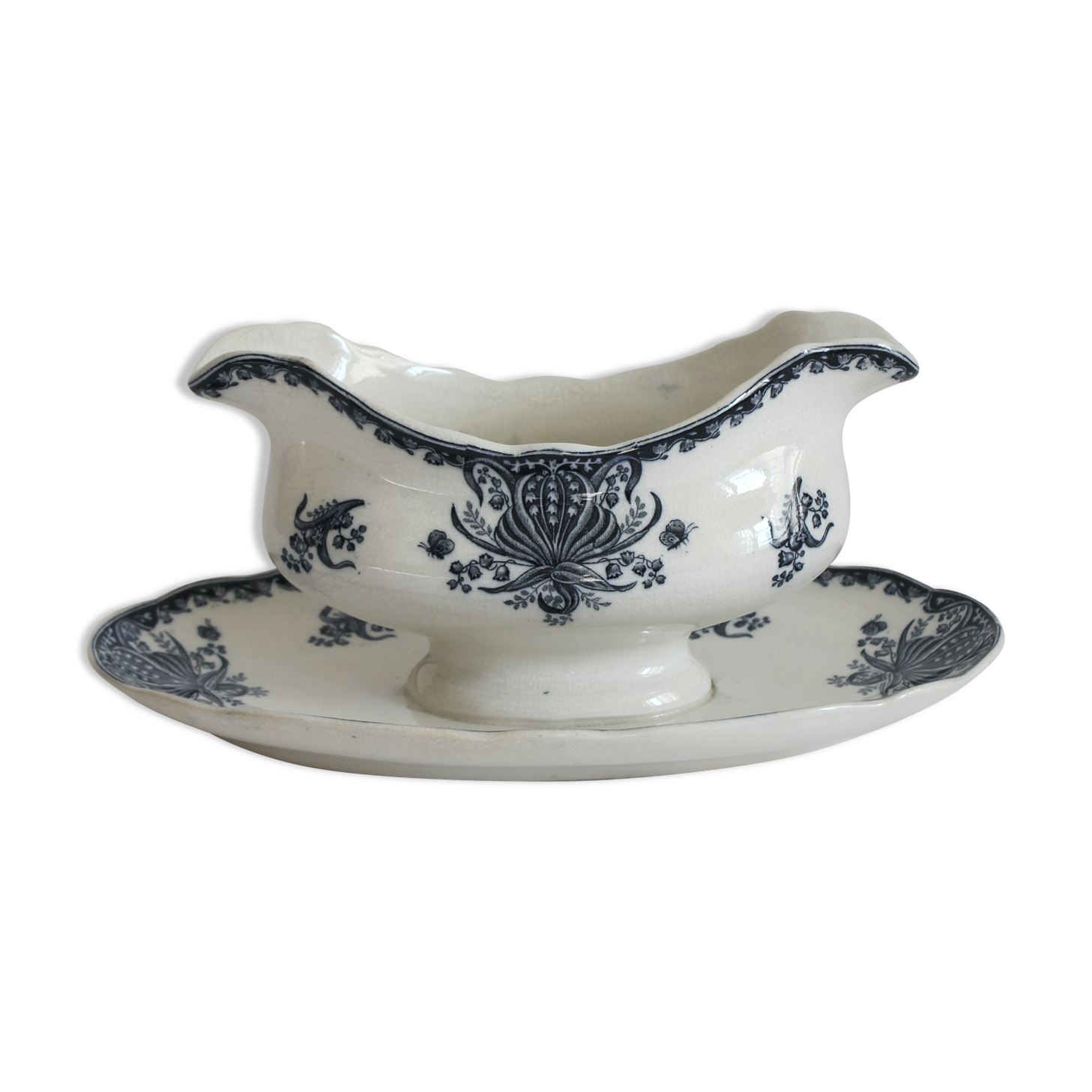 Ironware sauce boat with blue palmette decoration