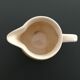 Yellow straw and ivory pitcher