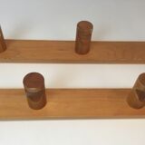 Charlotte Perriand, pair of fir wall coat racks, French work, around 1970