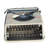 Hermes Baby typewriter with bag