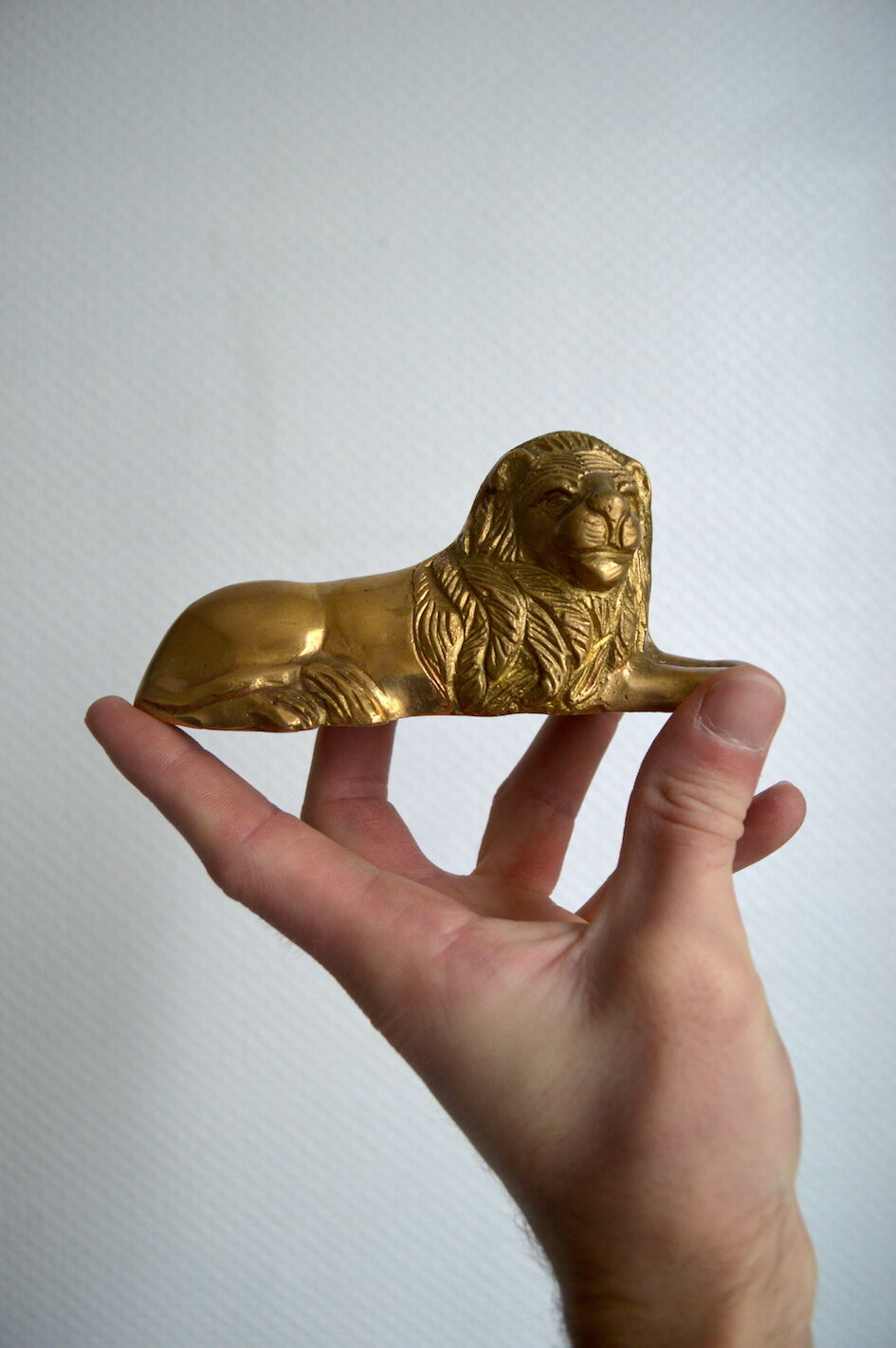 Brass lion paperweight