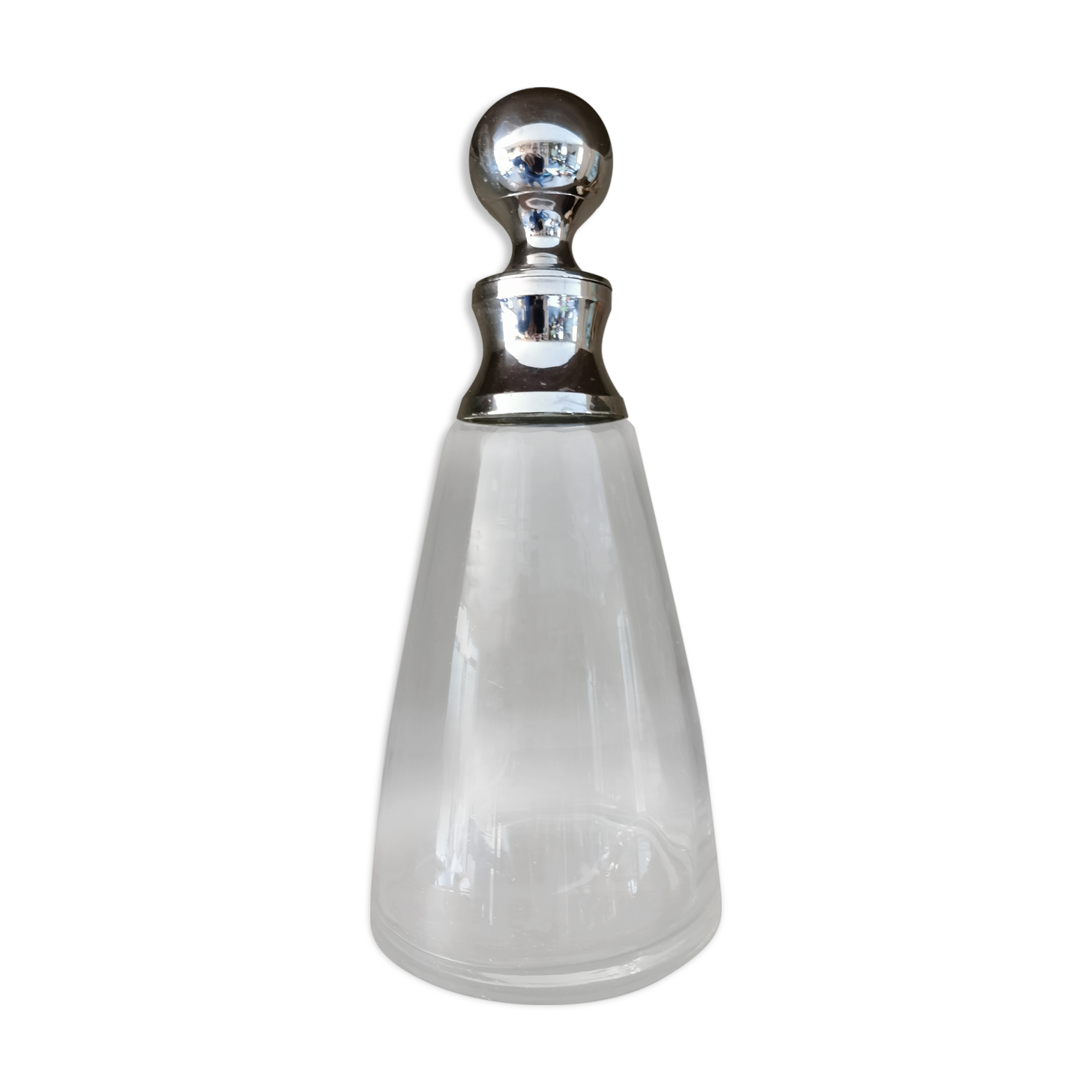 Old glass and silver metal carafe