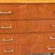 Vintage walnut varnished chest of drawers with 4 drawers from the 1960s.