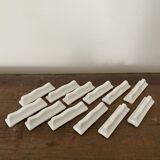 Vintage knife holders of 12, in white wave-shaped porcelain