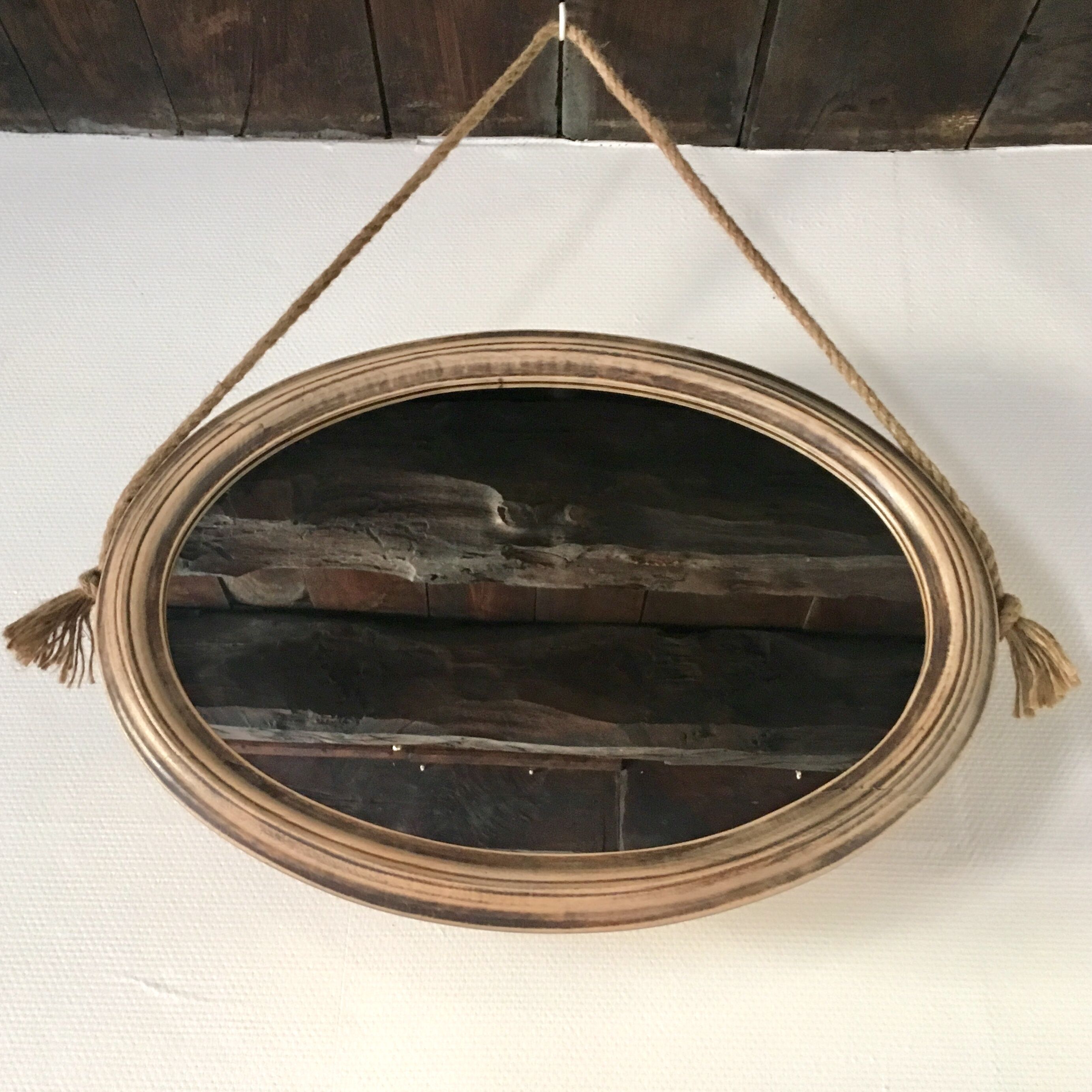 Oval wooden mirror and natrurel rope