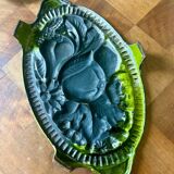 Old enameled cast iron trivet