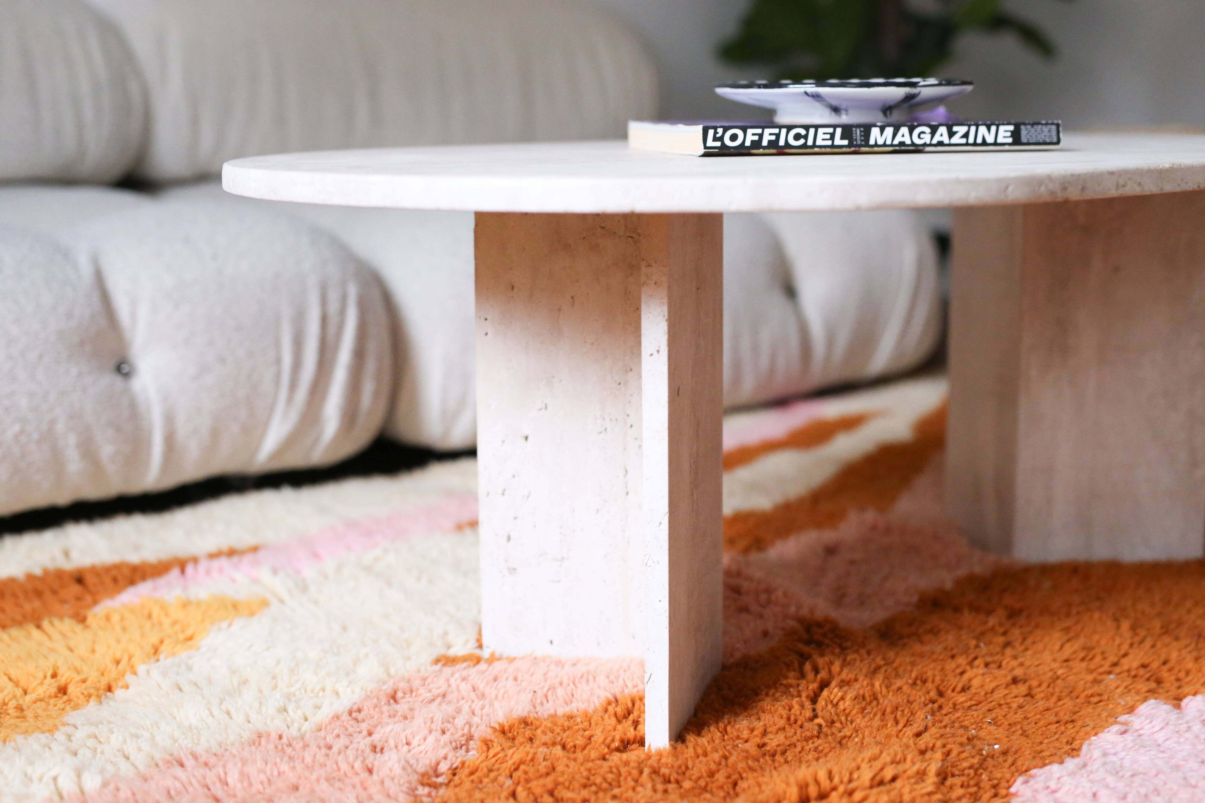 Oval travertine coffee table