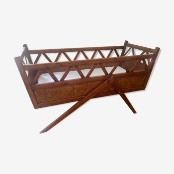 Wooden cot with compass feet from the 1950s