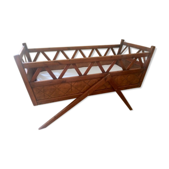 Wooden cot with compass feet from the 1950s