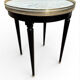 Bouillotte table in Louis XVI style made of blackened wood, marble, and brass.