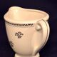Antique milk jug in Gien earthenware, Valence model A040.